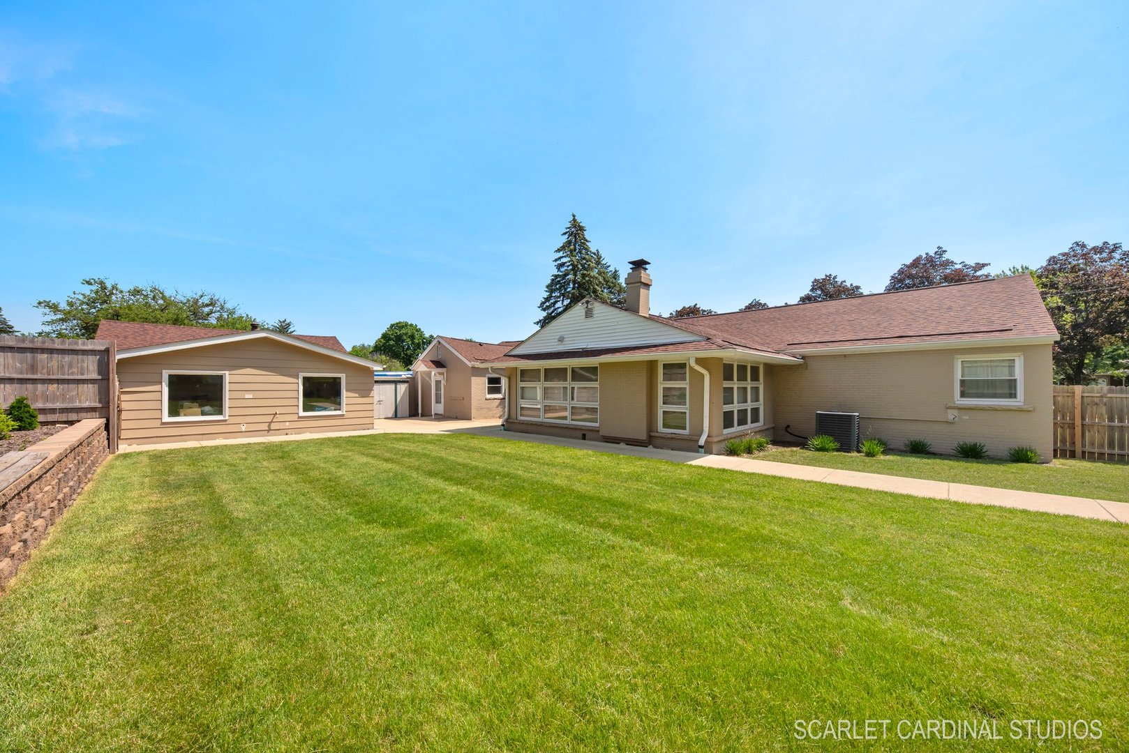 706 South Gables Boulevard Wheaton, IL 60189 - Photo 24 of 26 a house view with a garden space