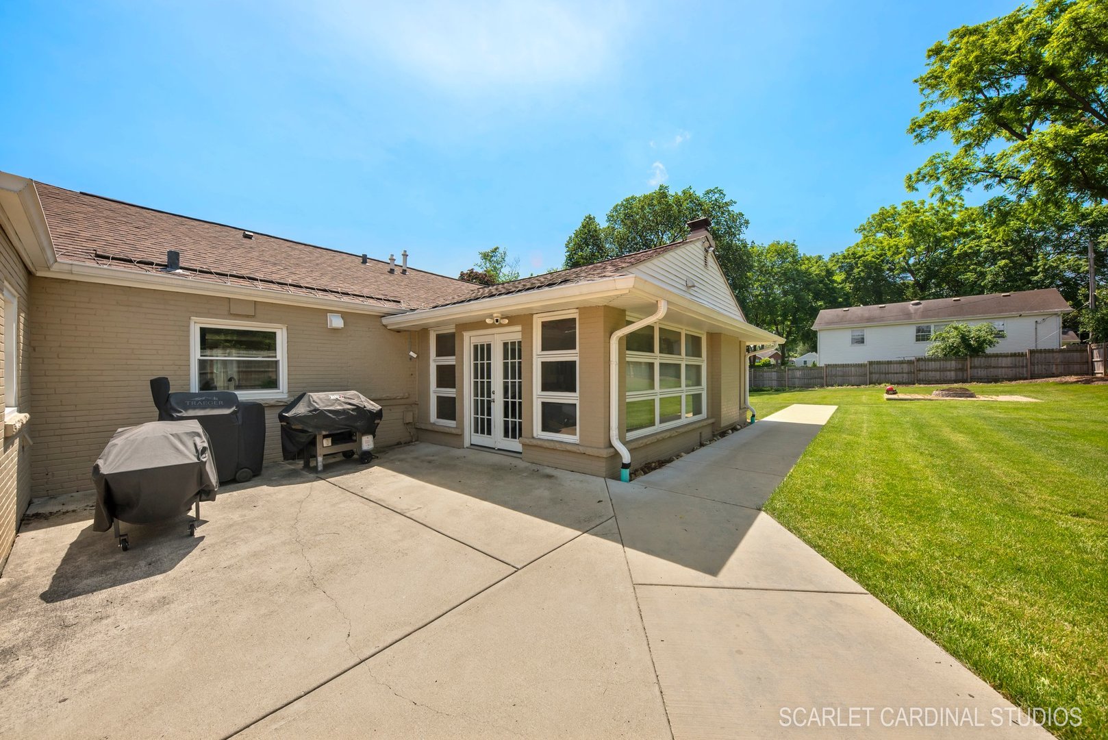 706 South Gables Boulevard Wheaton, IL 60189 - Photo 25 of 26 a view of a house with backyard sitting area and garden