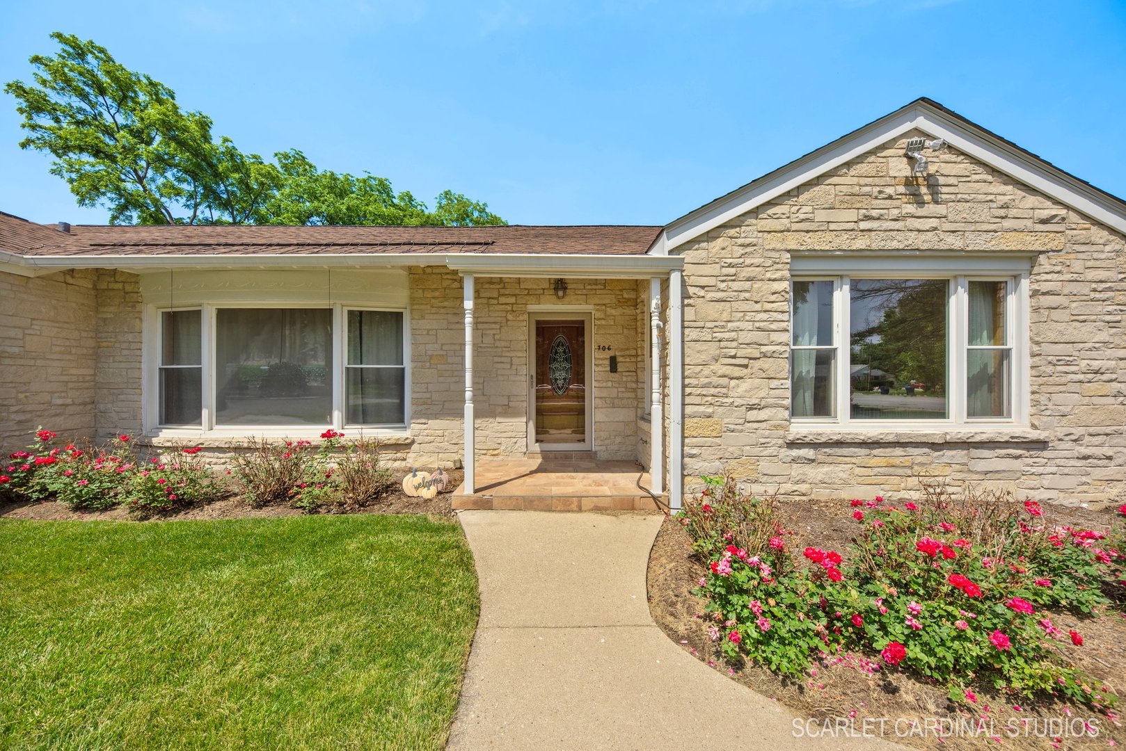 706 South Gables Boulevard Wheaton, IL 60189 - Photo 3 of 26 front view of a house with a yard