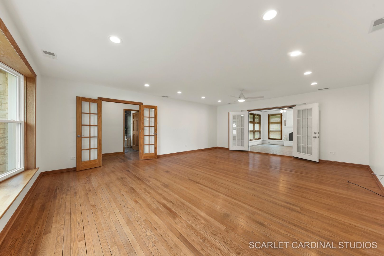 706 South Gables Boulevard Wheaton, IL 60189 - Photo 4 of 26 a view of empty room with wooden floor and windows