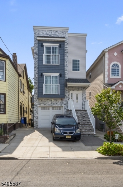 a front view of a house with yard