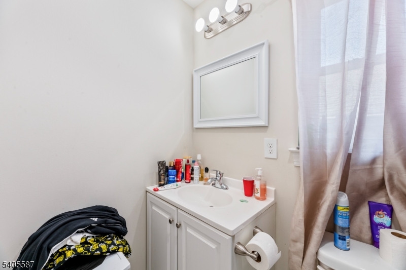 14 Spencer Street Elizabeth, NJ 07202 - Photo 28 of 39 a utility room with dryer and washer
