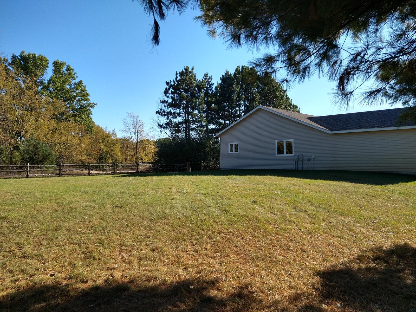 11638 Pierce Road Canadian Lakes, MI 49346 - Photo 27 of 32 27 Large Fenced Back Yard