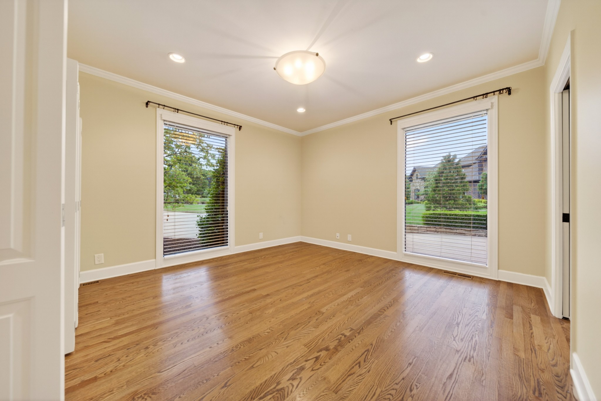101 Kennett Road Old Hickory, TN 37138 - Photo 64 of 100 a view of an empty room with wooden floor and a window