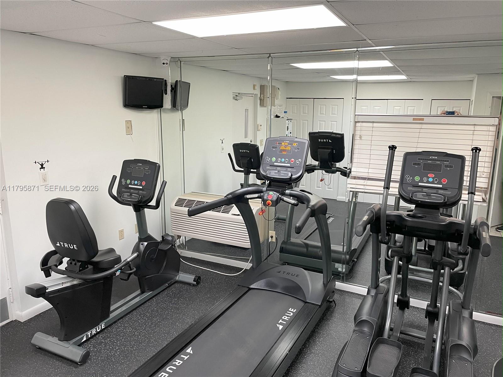 126 Southwest 17th Road, Unit 505 Miami, FL 33129 - Photo 18 of 27 a view of a kitchen with gym equipment