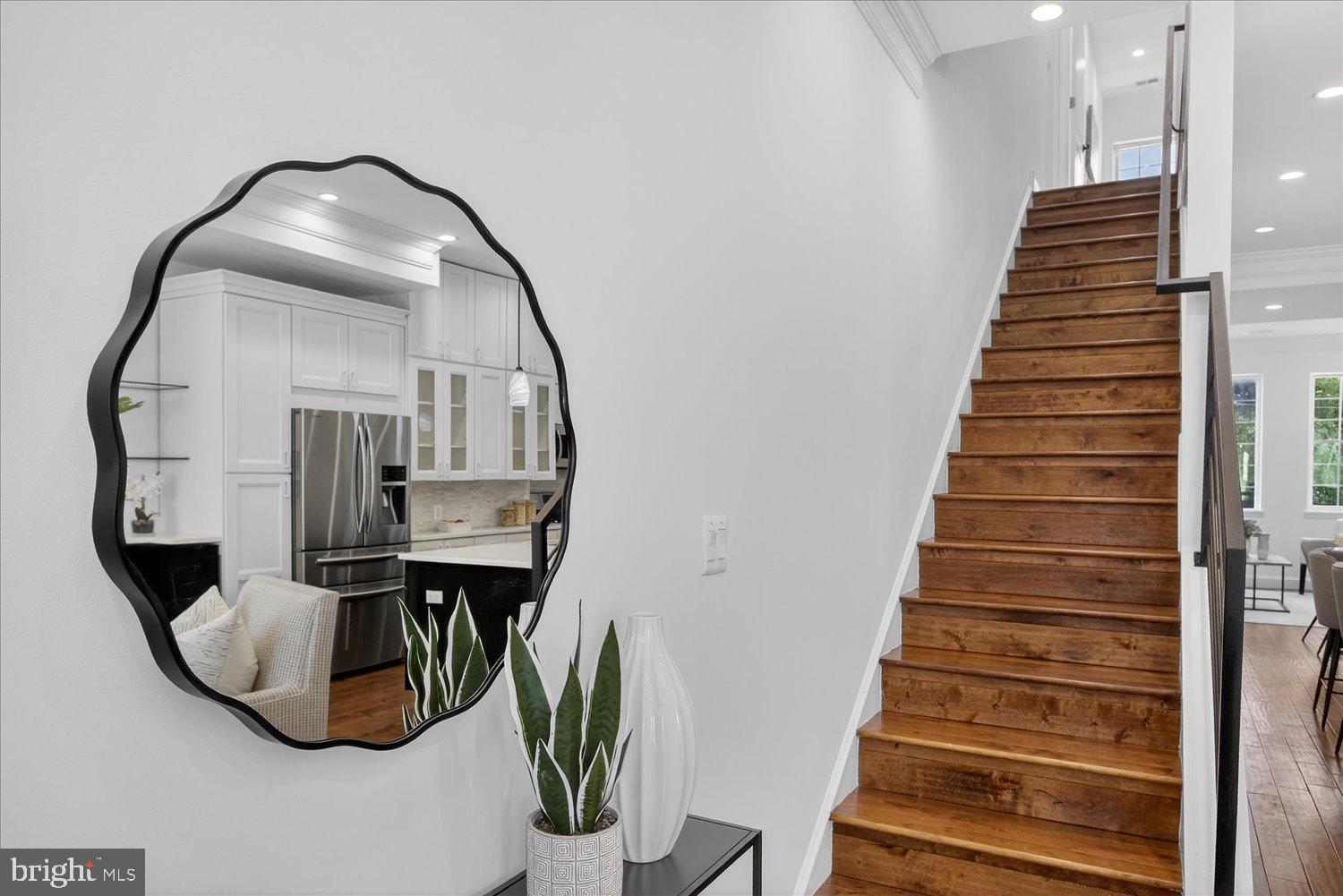 612 9th Street Northeast Washington, DC 20002 - Photo 11 of 36 Inviting entryway with elegant staircase.