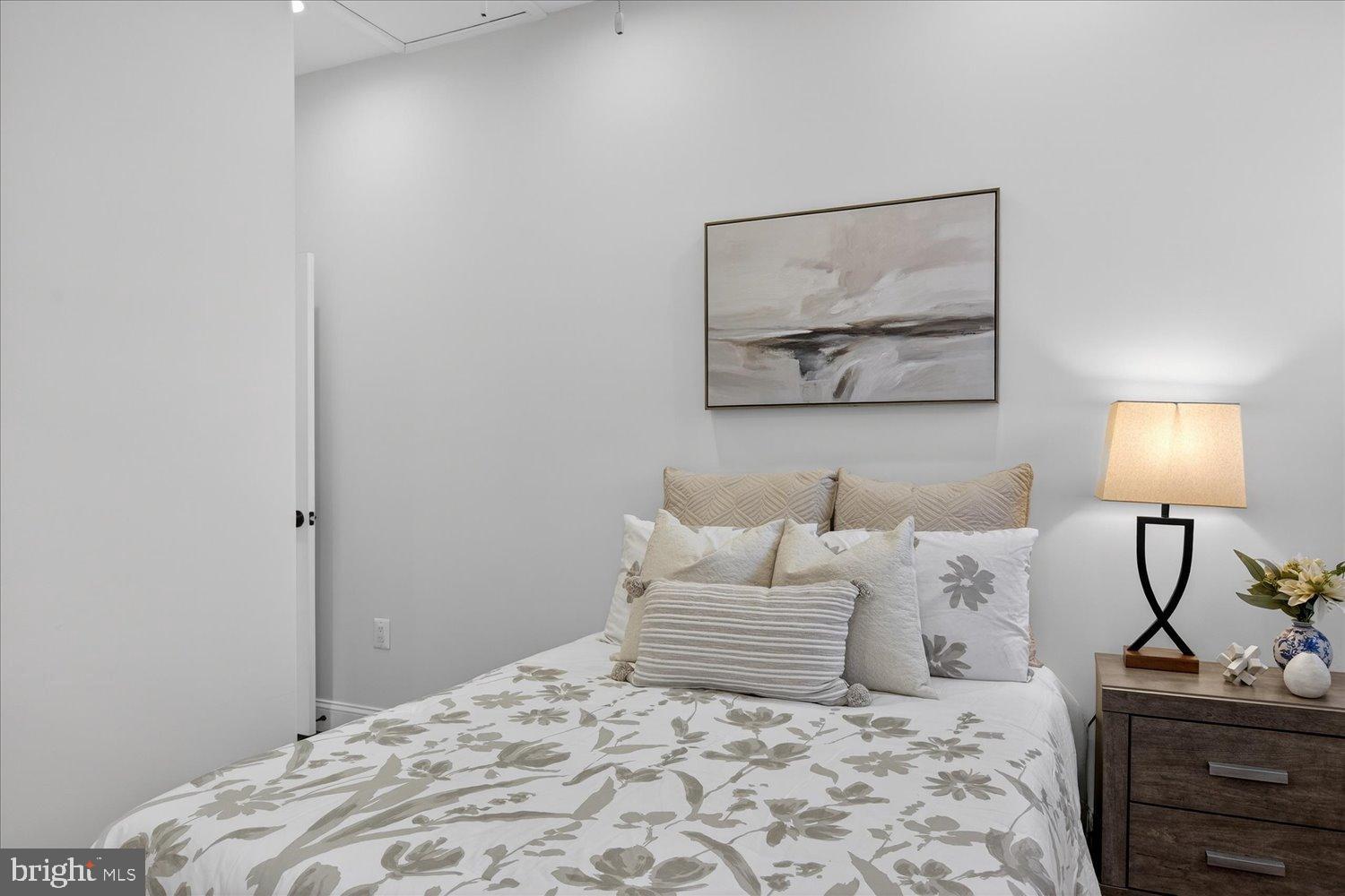 612 9th Street Northeast Washington, DC 20002 - Photo 14 of 36 Serene bedroom with soft floral accents.