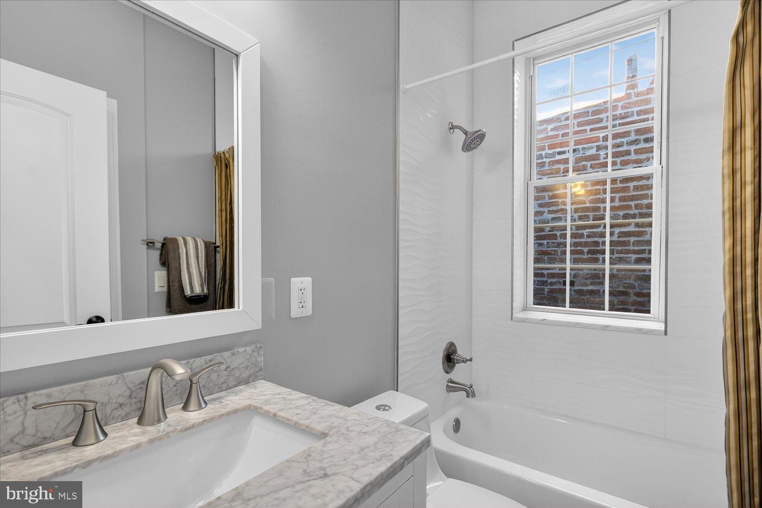 612 9th Street Northeast Washington, DC 20002 - Photo 16 of 36 Modern bathroom with natural light.