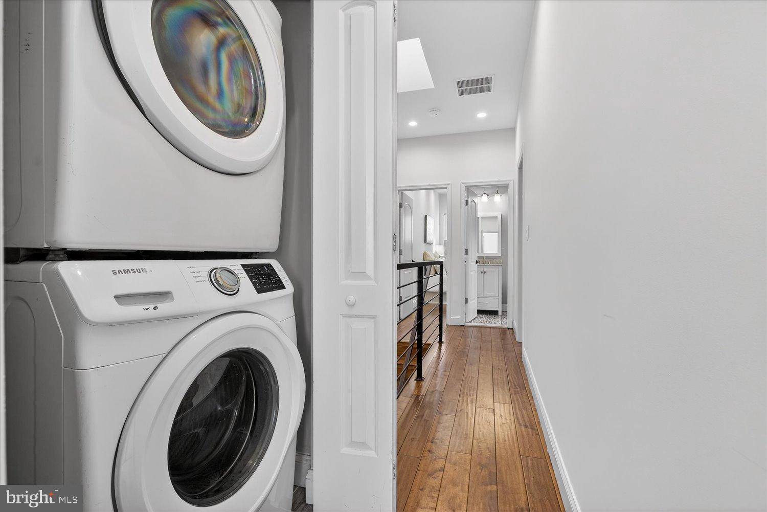 612 9th Street Northeast Washington, DC 20002 - Photo 19 of 36 Modern laundry nook with sleek appliances.