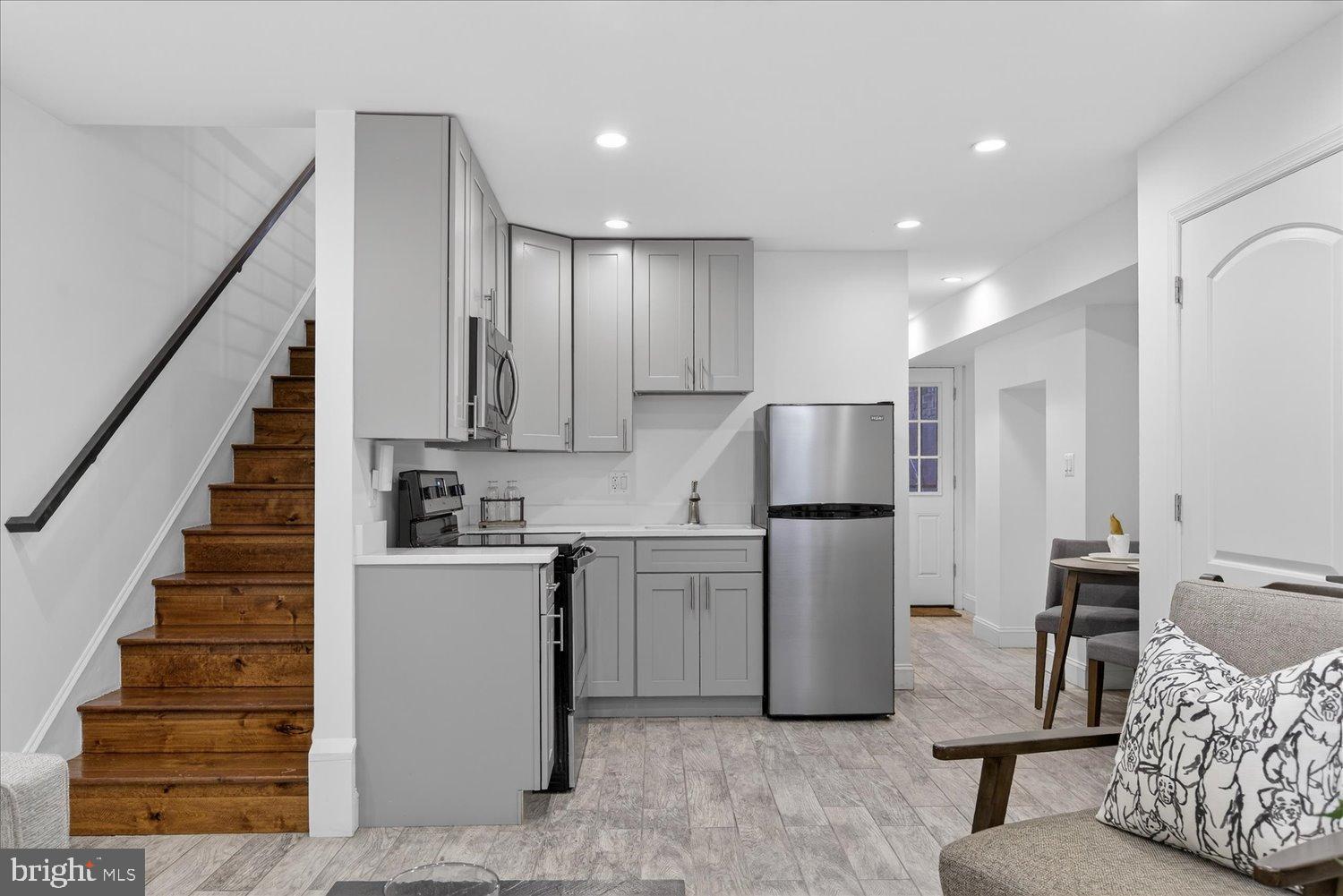 612 9th Street Northeast Washington, DC 20002 - Photo 26 of 36 Lower level kitchen with sleek finishes.