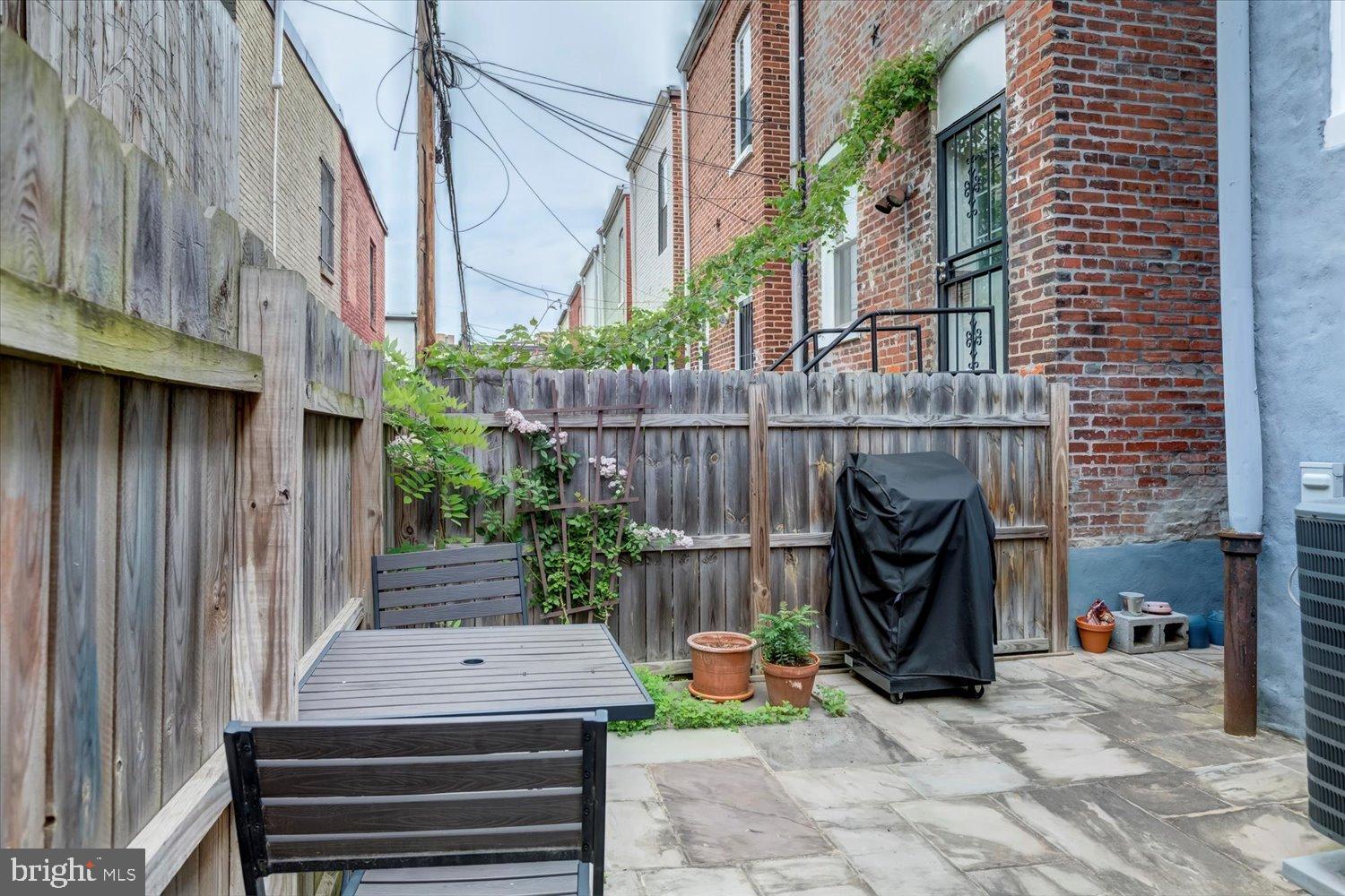 612 9th Street Northeast Washington, DC 20002 - Photo 32 of 36 Charming backyard retreat with rustic charm.