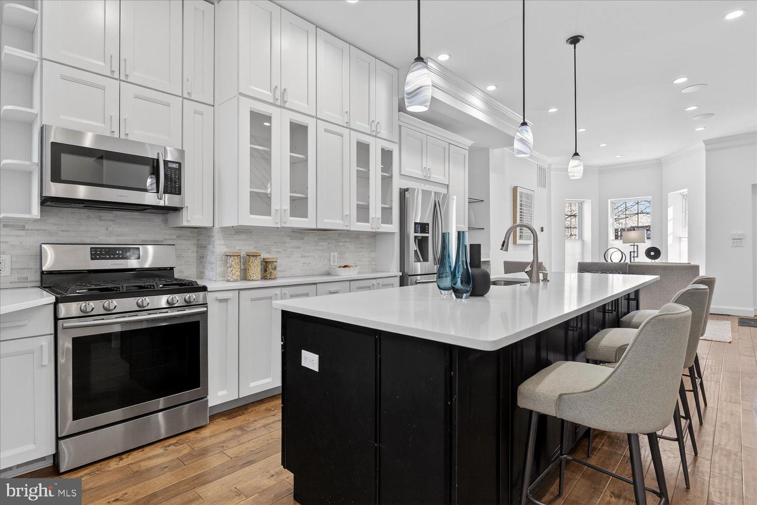 612 9th Street Northeast Washington, DC 20002 - Photo 5 of 36 Sleek modern kitchen with elegant finishes.
