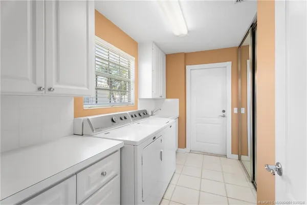 a kitchen with a sink and a window