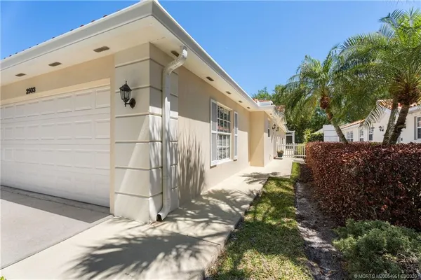 a view of a back yard of the house