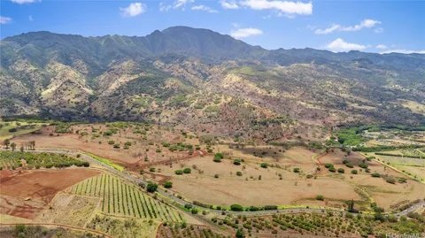 a view of a backyard of a house