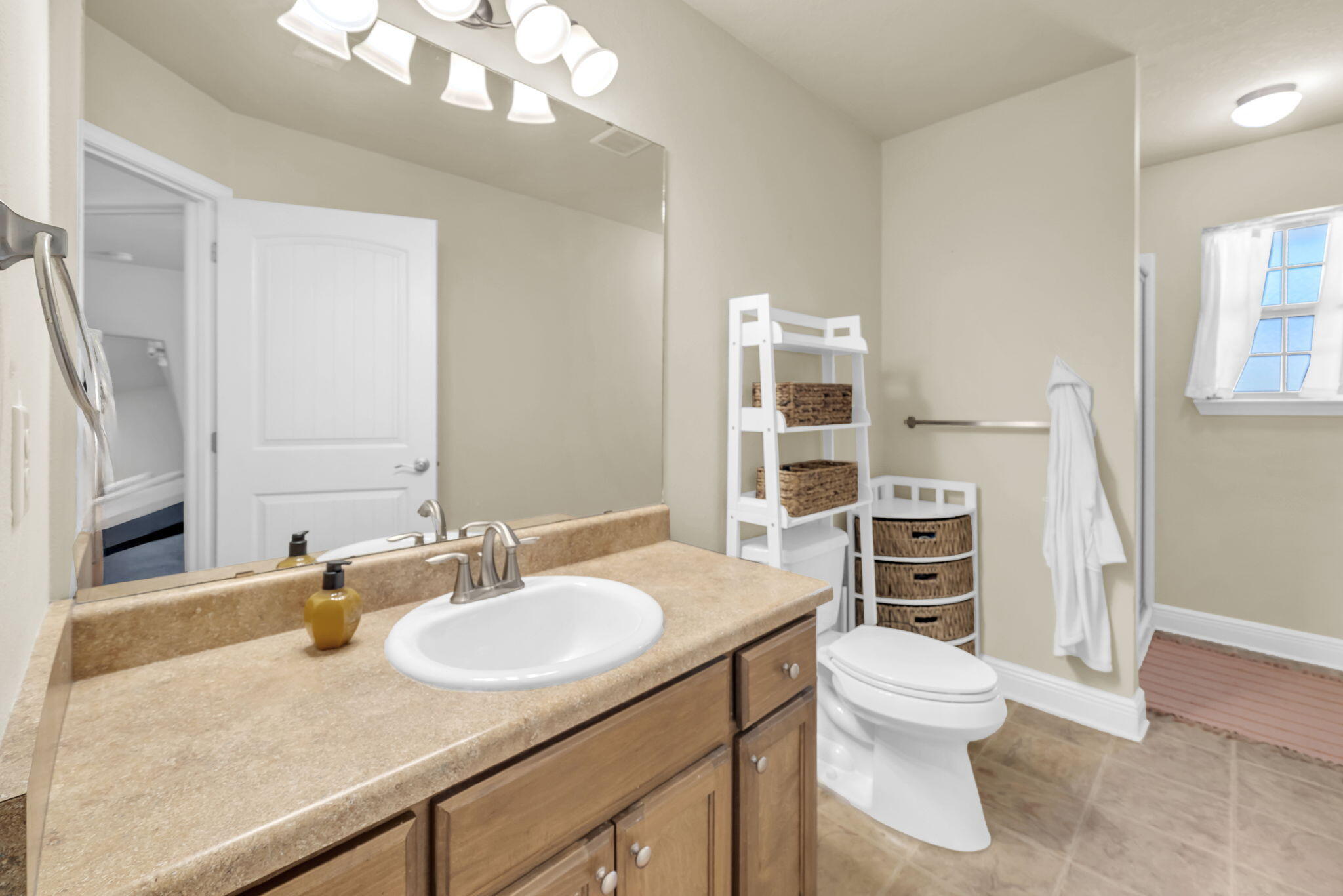 217 Raptor Drive Crestview, FL 32536 - Photo 41 of 48 a bathroom with a granite countertop sink toilet and shower