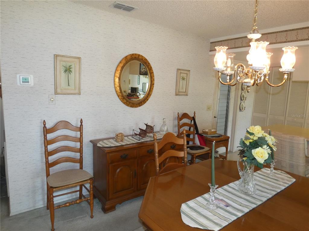 11151 Sandtrap Drive, Unit 11151 Port Richey, FL 34668 - Photo 21 of 33 a view of a workspace with furniture