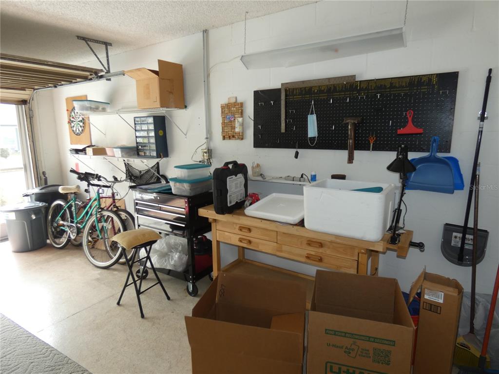 11151 Sandtrap Drive, Unit 11151 Port Richey, FL 34668 - Photo 31 of 33 a room with musical instruments