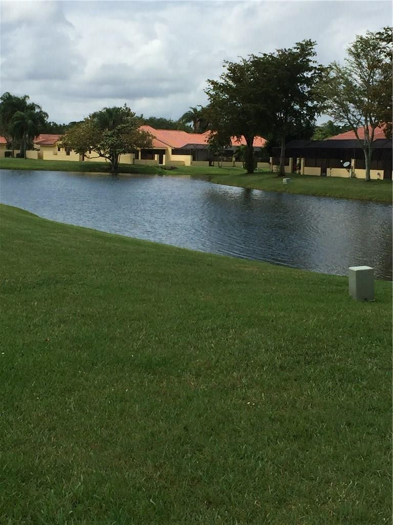 8610 Nadmar Avenue Boca Raton, FL 33434 - Photo 28 of 32 ONE OF LAKES SURROUNDING PROPERTY