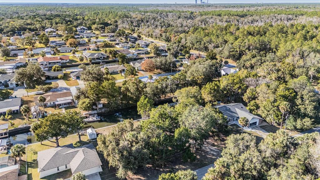 3924 North Apalachee Point Crystal River, FL 34428 - Photo 18 of 20 an aerial view of a houses with a yard