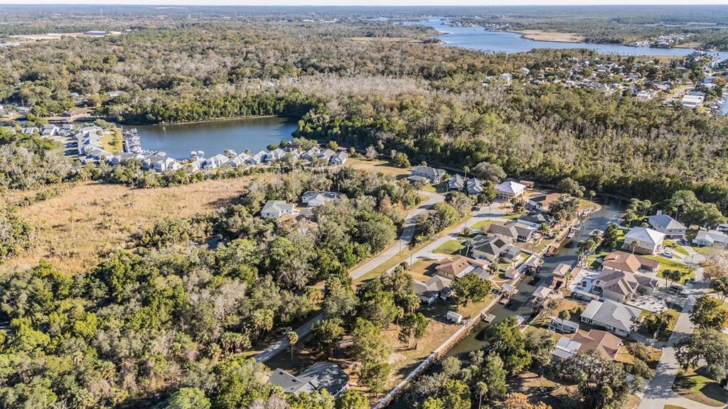 3924 North Apalachee Point Crystal River, FL 34428 - Photo 9 of 20 an aerial view of a house with a lake view