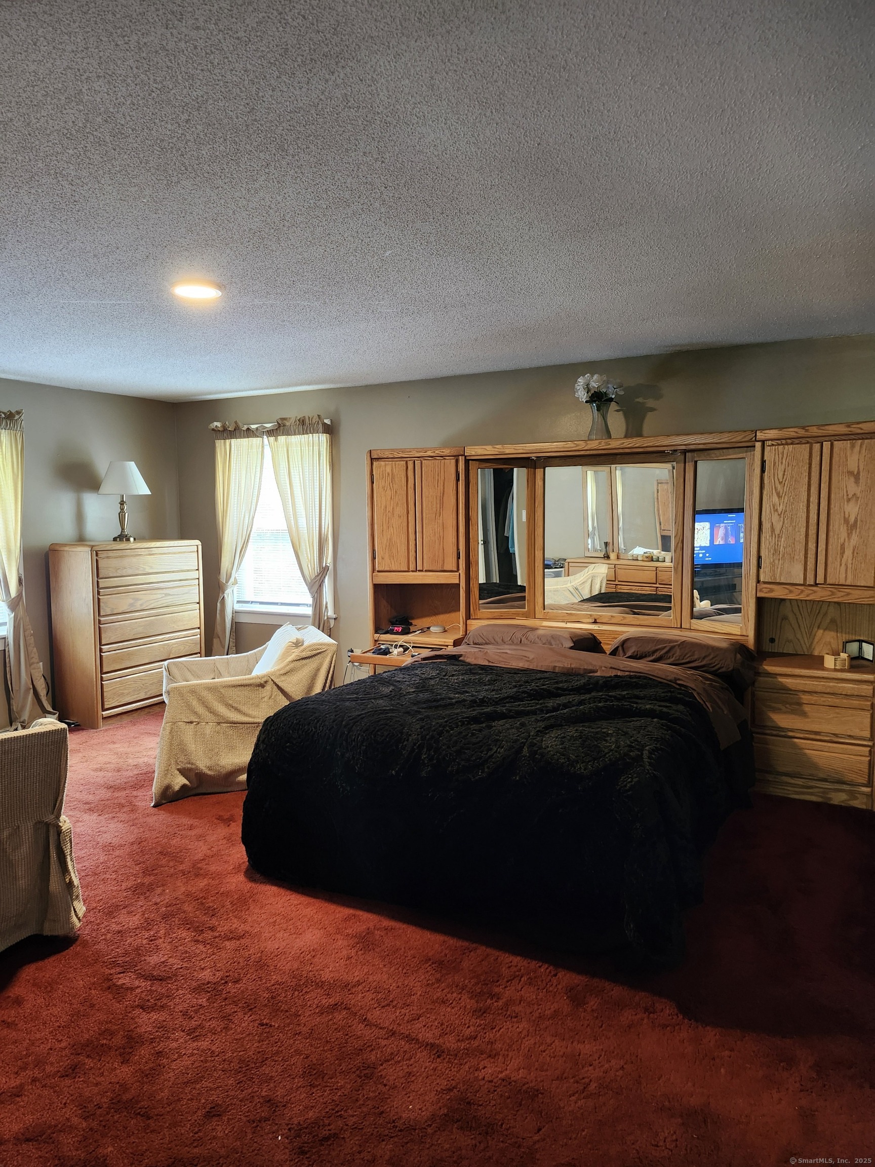 39 Loren Circle Windsor, CT 06095 - Photo 16 of 16 a bedroom with a bed and window