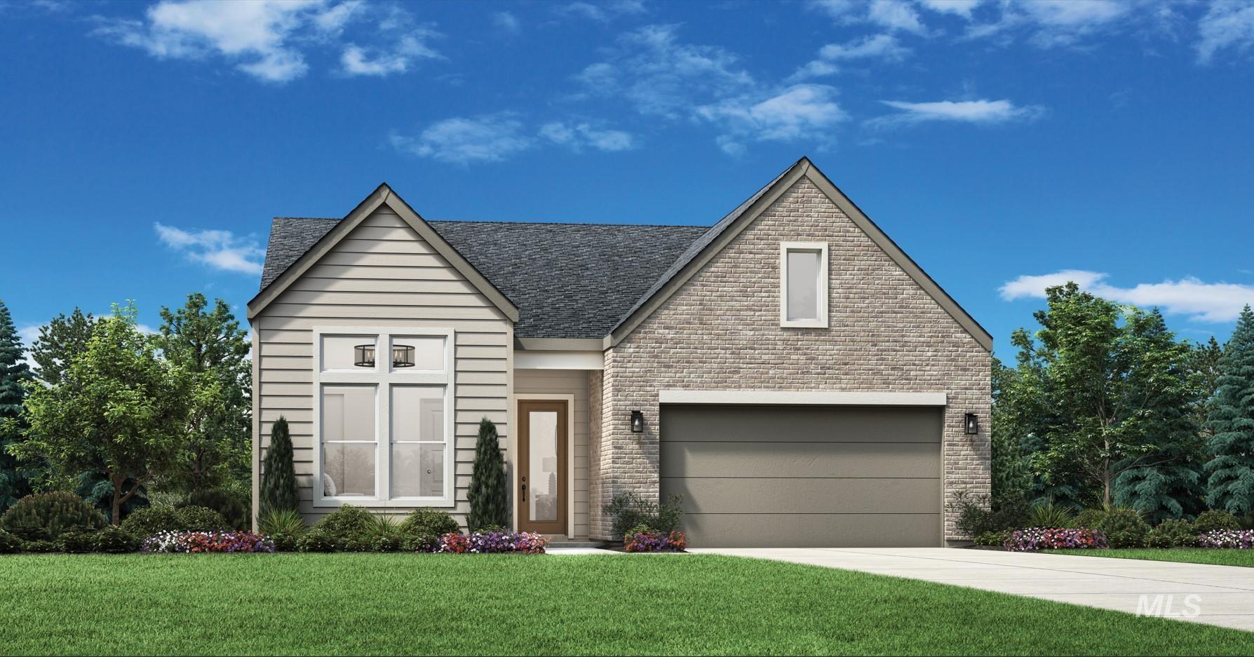 5317 Juliet Rose Avenue Caldwell, ID 83607 - Photo 1 of 1 View of front of property featuring a front yard, concrete driveway, stone siding, and a garage