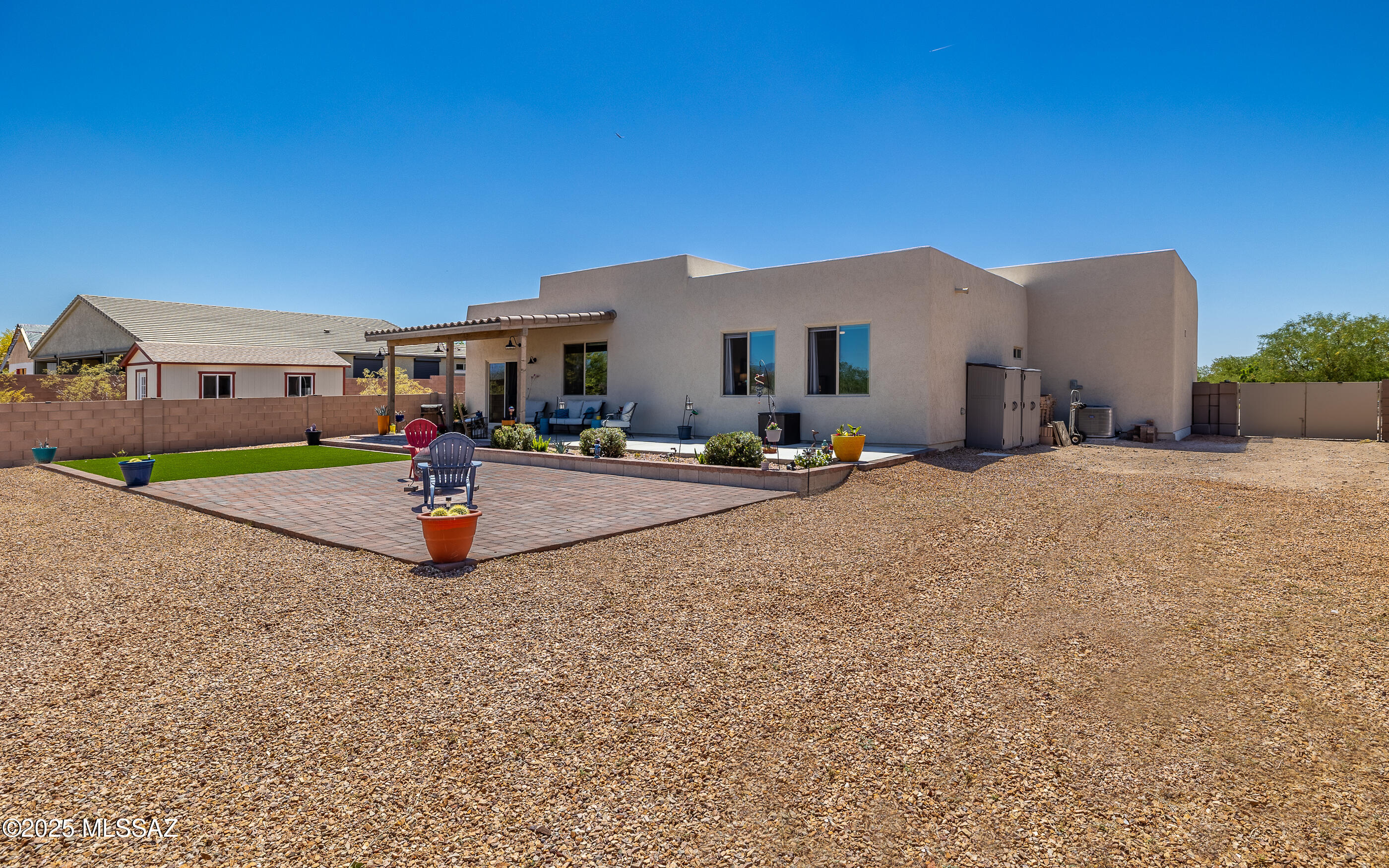 12123 Creosote Valley Road Vail, AZ 85641 - Photo 17 of 46 a view of a house with a patio