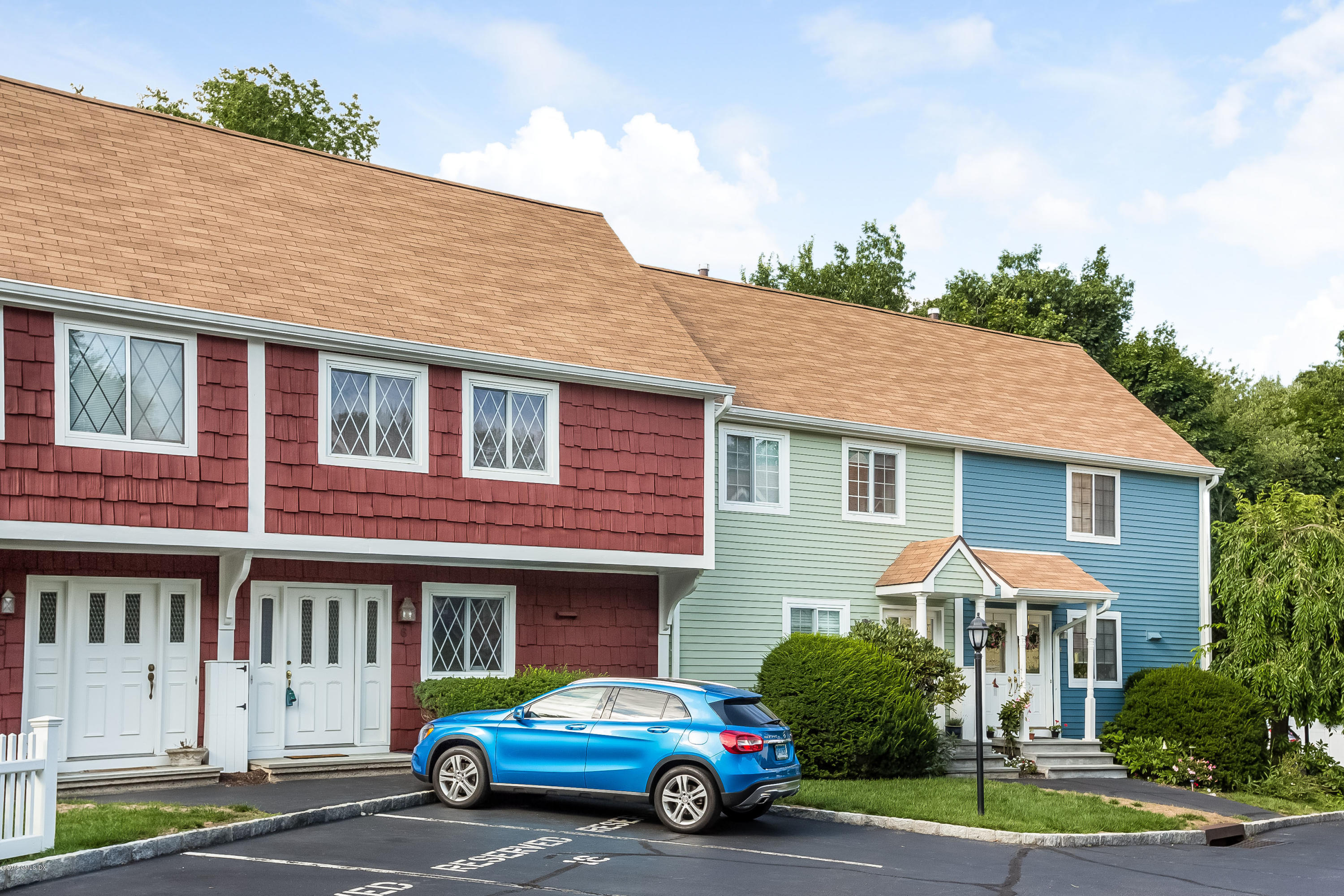 a car parked in front of a house