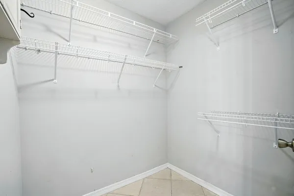 a view of a room with racks on the wall