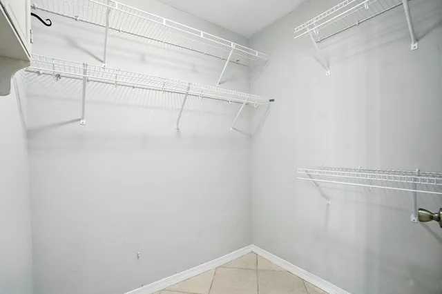 a view of a room with racks on the wall