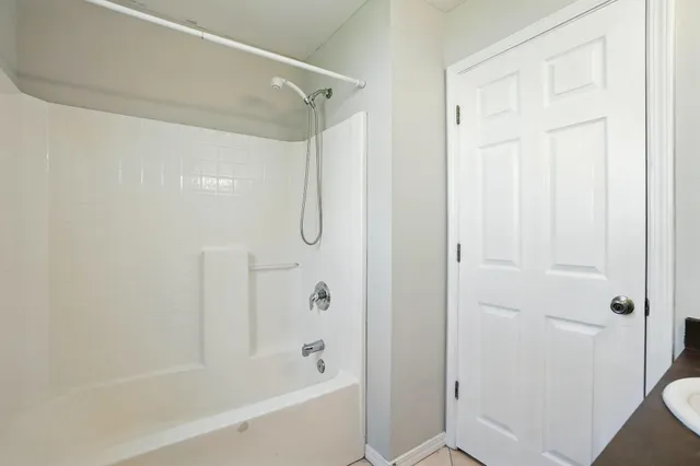 a bathroom with a bathtub