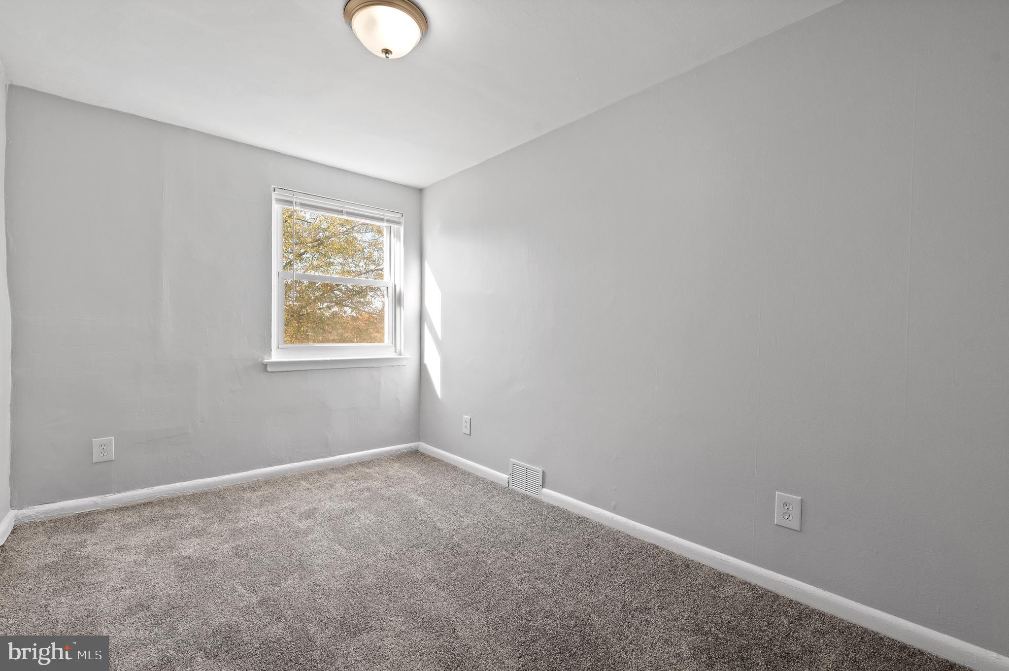 1222 Harshaw Road Brookhaven, PA 19015 - Photo 14 of 25 a view of an empty room with a window