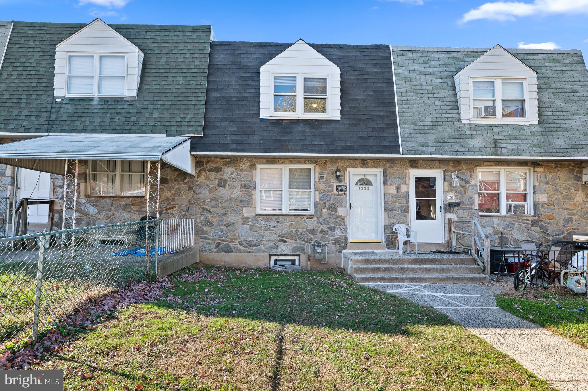1222 Harshaw Road Brookhaven, PA 19015 - Photo 2 of 25 a front view of a house with garden