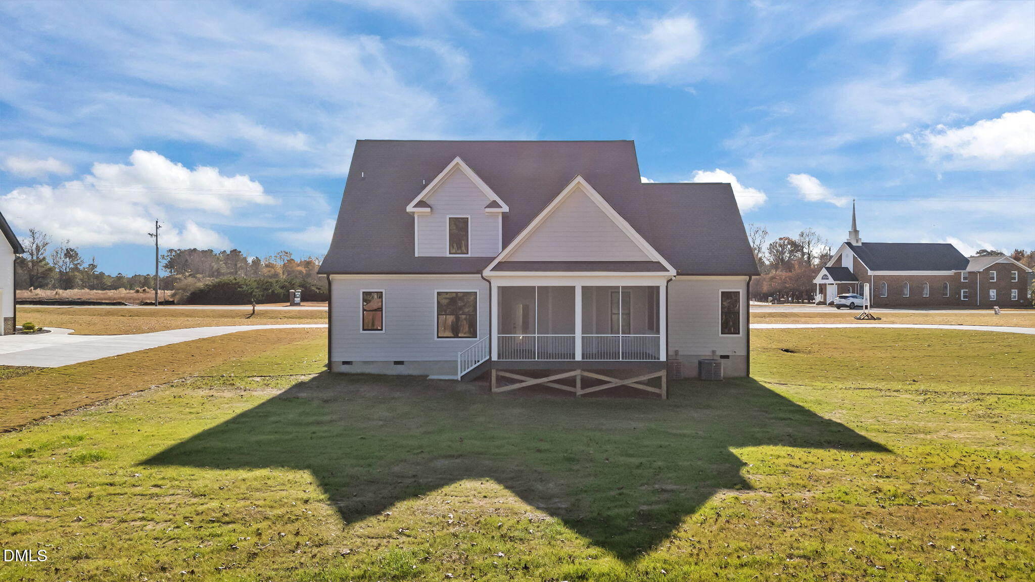 2568 Lassiter Road Four Oaks, NC 27524 - Photo 37 of 50 a view of a house with a swimming pool