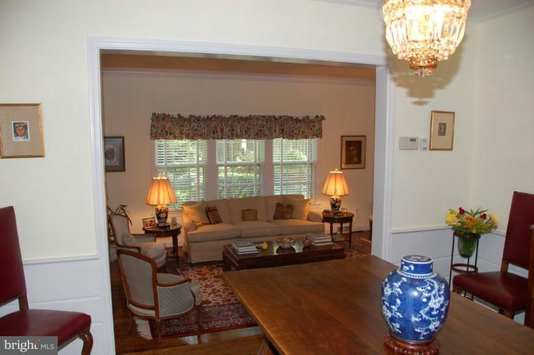 9507 Bruce Drive Silver Spring, MD 20901 - Photo 4 of 16 a living room with furniture and a chandelier