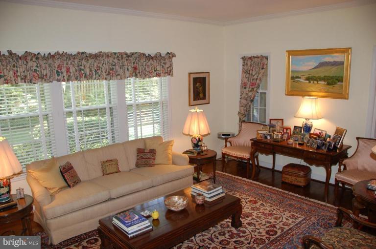 9507 Bruce Drive Silver Spring, MD 20901 - Photo 6 of 16 a living room with furniture and a large window