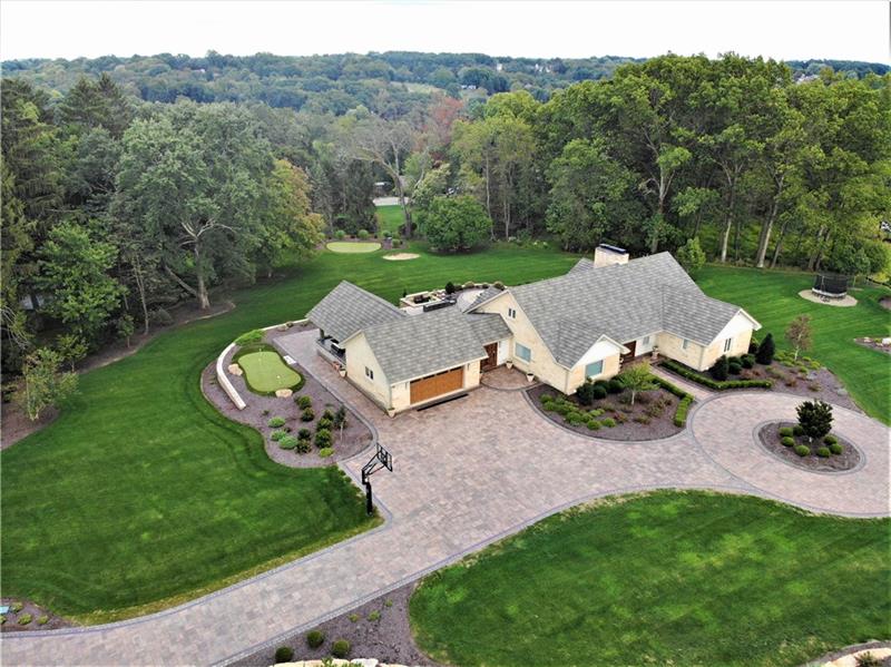 5 Little Meadow Road Wexford, PA 15090 - Photo 1 of 25 Enter into this 2.2 Acre Oasis in the Wexford Flats. Beautifully placed Stone Paver Driveway and Patio. Lifetime Metal Roof. Total Renovation is 5 years young. Stone House with Gorgeous Landscaping with irrigation system and accent lighting.