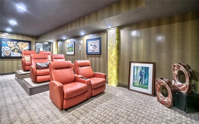 5 Little Meadow Road Wexford, PA 15090 - Photo 19 of 25 Theatre room with sculpted carpeting, accent lighting, wet bar with beverage cooler. Electric Fireplace.