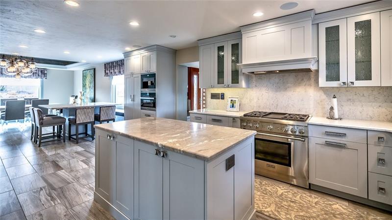 5 Little Meadow Road Wexford, PA 15090 - Photo 5 of 25 Wonderful open kitchen for entertaining. Granite Breakfast area and then next to is the Open and Bright Dining Room.