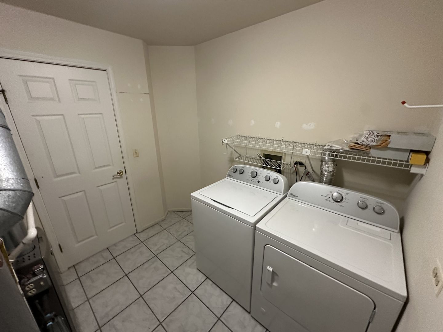 802 Butternut Lane, Unit C Mount Prospect, IL 60056 - Photo 15 of 15 a utility room with dryer and washer