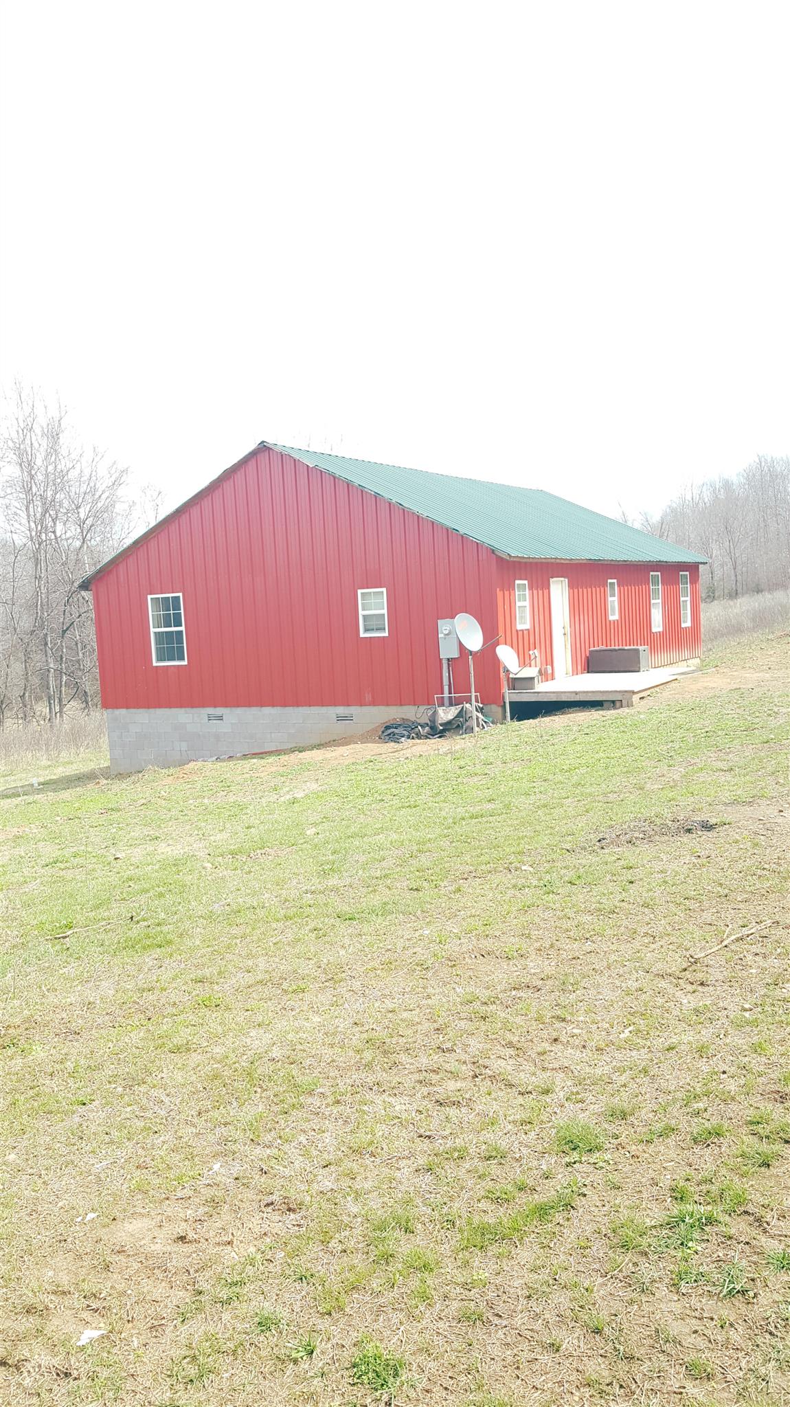 491 Upper Standing Rock Road Dover, TN 37058 - Photo 1 of 24 Wow almost 22 acres of awesome land with trees for the nature lover,...horse barn with 7 stall and 1 tack room well, new septic , year round creek ! Private no neighbors what are you waiting for ??