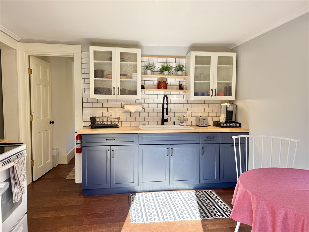 5 Bridge Street Montague, MA 01349 - Photo 15 of 36 a kitchen with stainless steel appliances granite countertop a stove and a sink