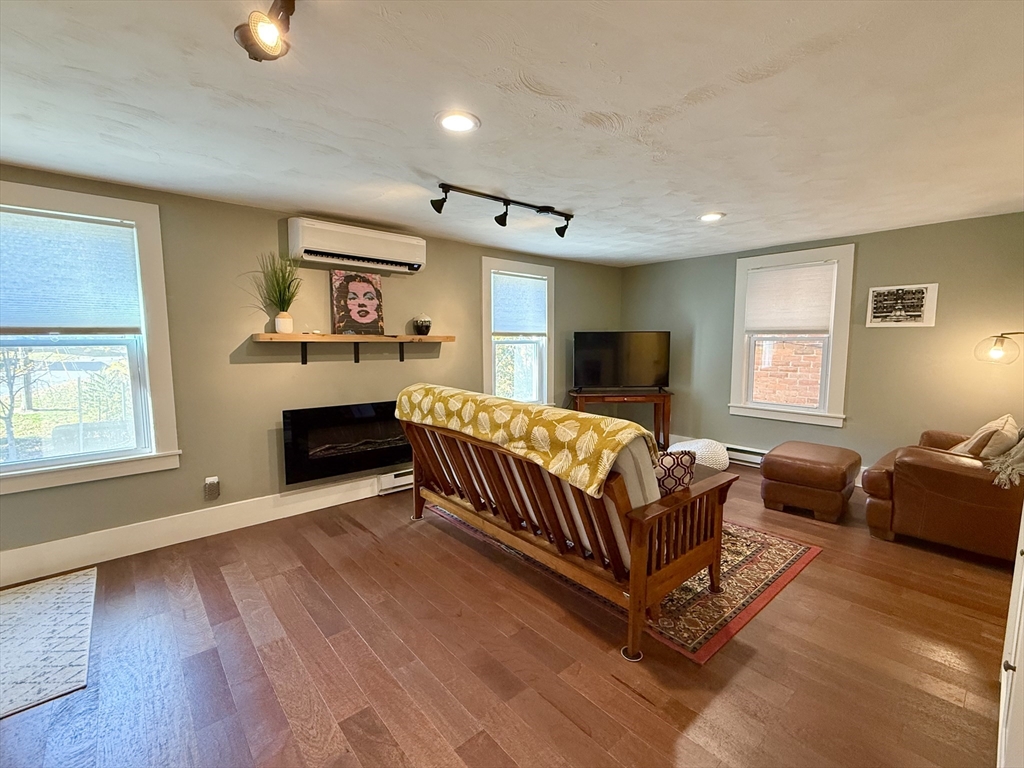 5 Bridge Street Montague, MA 01349 - Photo 19 of 36 a living room with furniture fireplace and flat screen tv