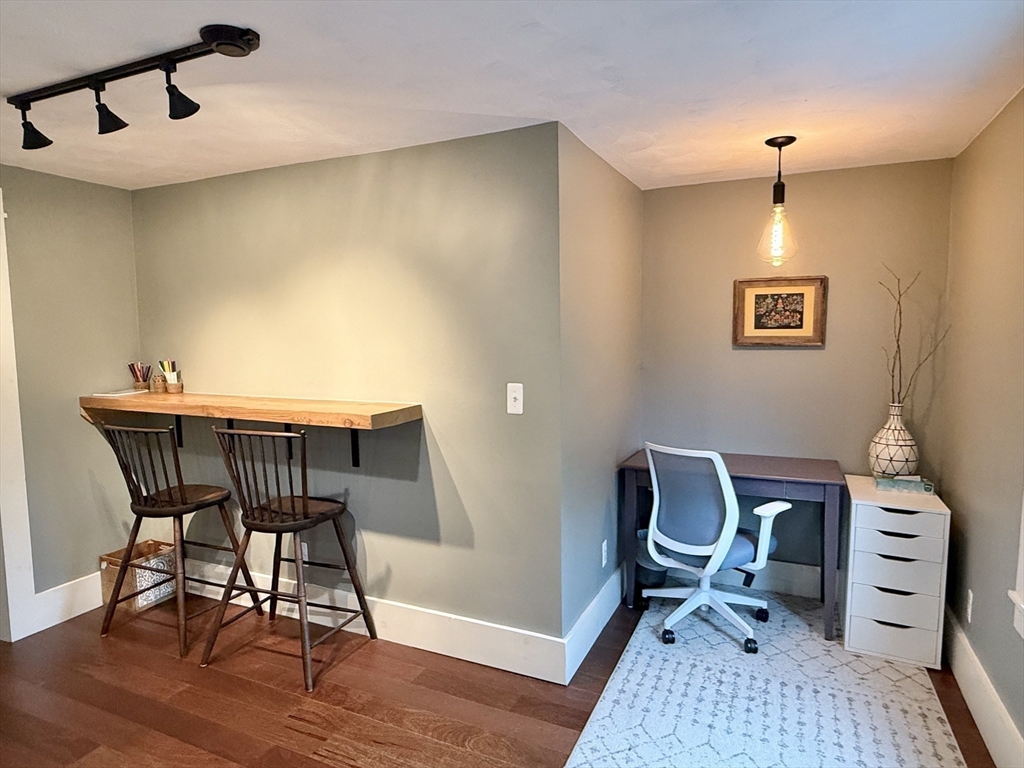 5 Bridge Street Montague, MA 01349 - Photo 23 of 36 a workspace with furniture and wooden floor