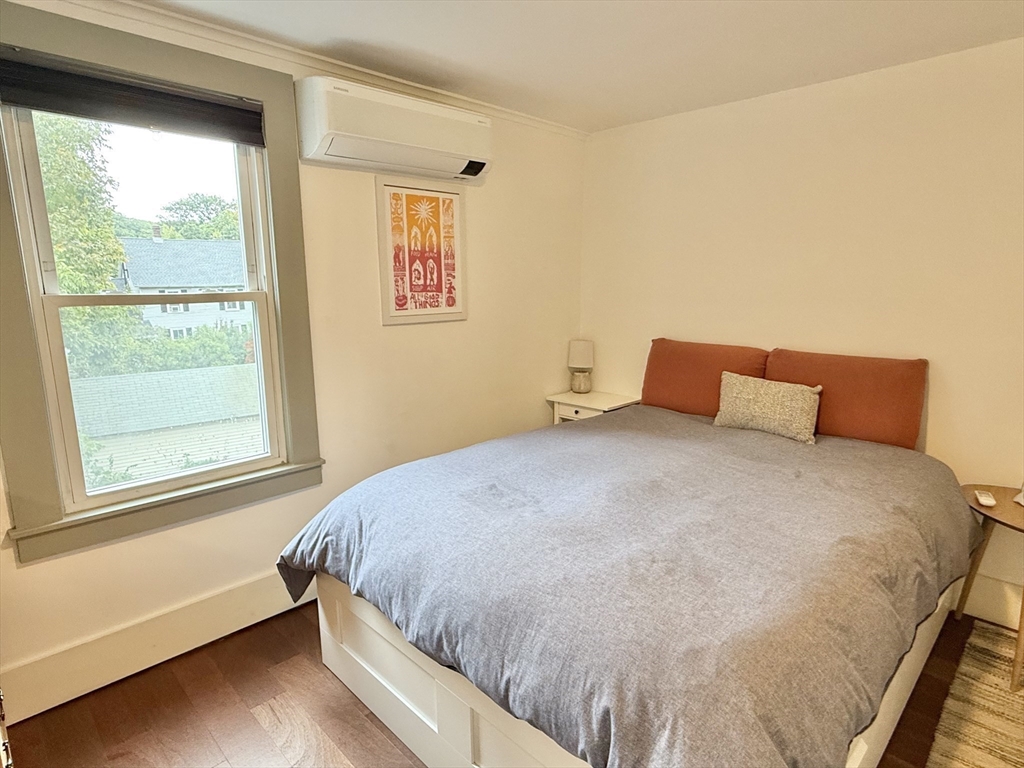 5 Bridge Street Montague, MA 01349 - Photo 28 of 36 a bedroom with a bed and wooden floor