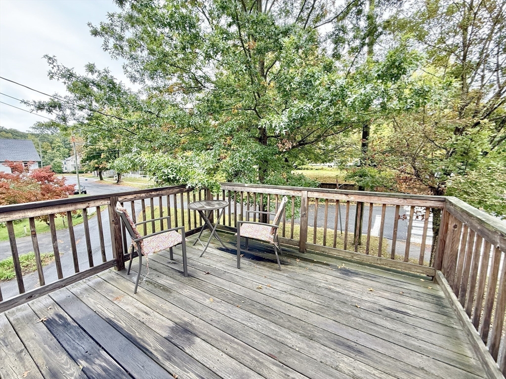 5 Bridge Street Montague, MA 01349 - Photo 30 of 36 a view of balcony with wooden floor and fence