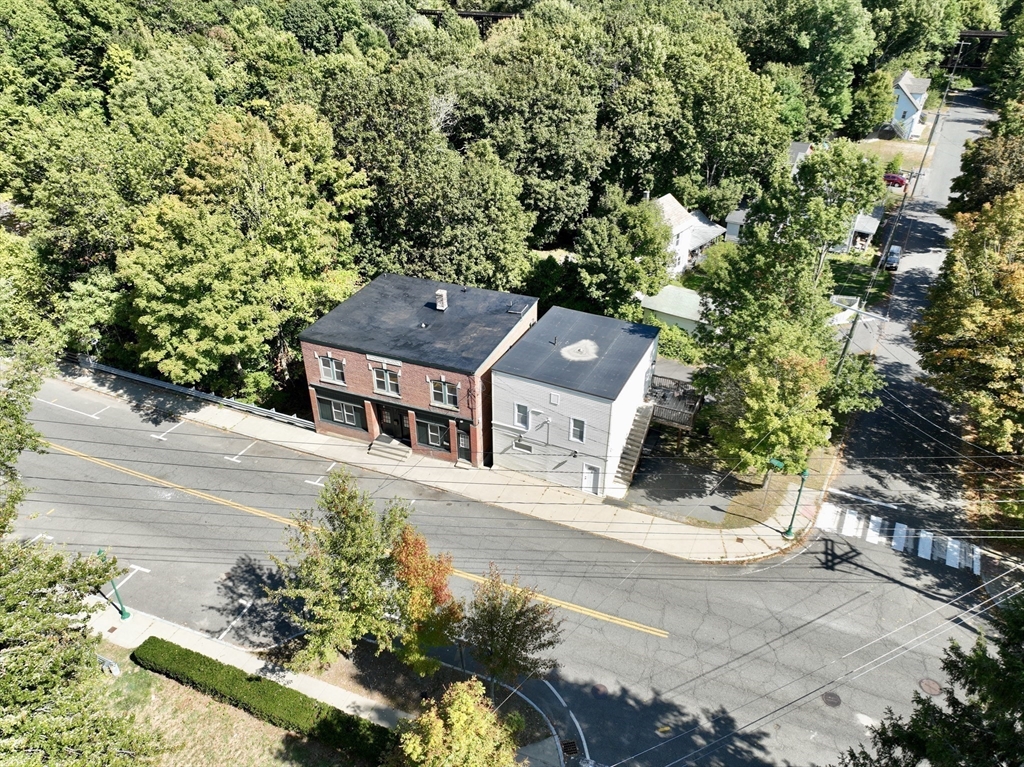 5 Bridge Street Montague, MA 01349 - Photo 33 of 36 an aerial view of a house with a yard basket ball court and outdoor seating