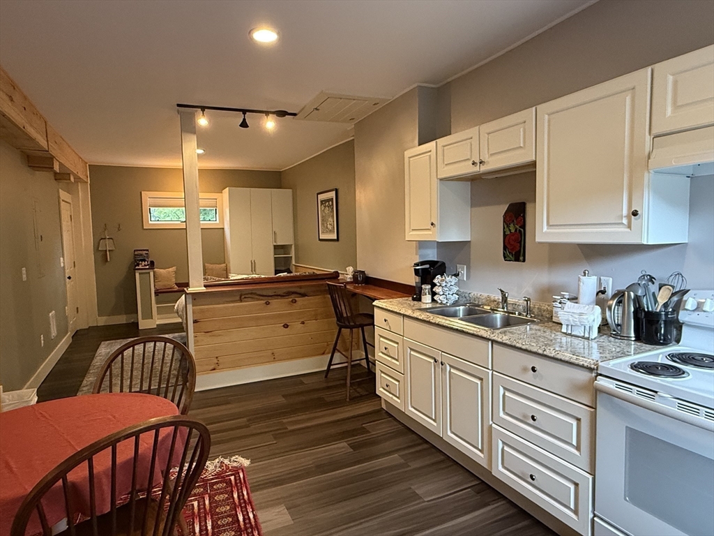 5 Bridge Street Montague, MA 01349 - Photo 5 of 36 a kitchen with sink cabinets and stove