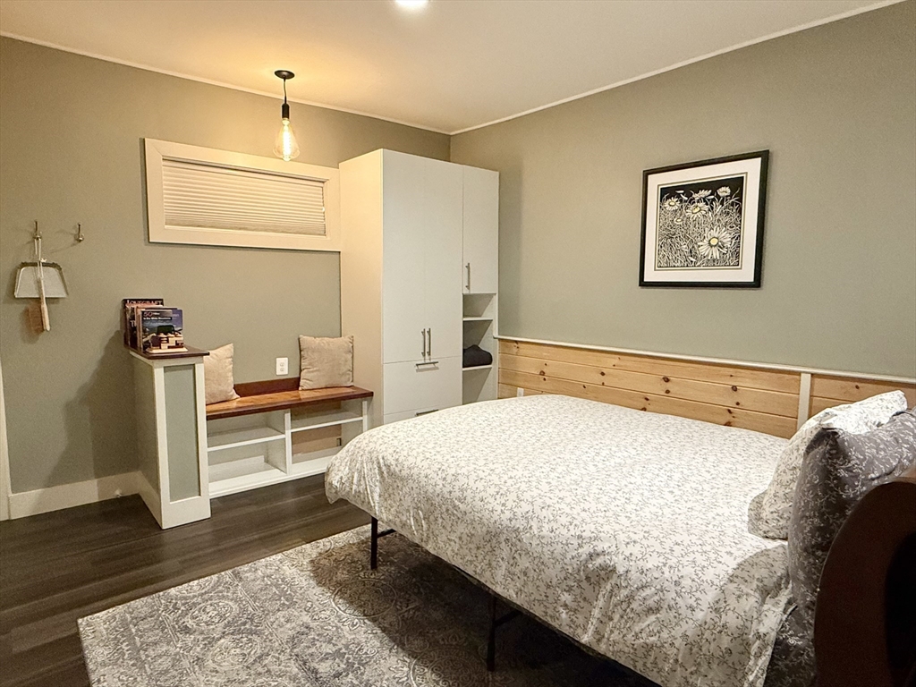5 Bridge Street Montague, MA 01349 - Photo 8 of 36 a bedroom with a bed and wooden floor